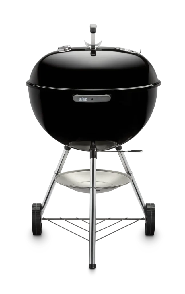 Barbacoa de carbón negra con ruedas y tapa.