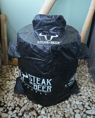 Funda negra Steak and Beer en piedras.